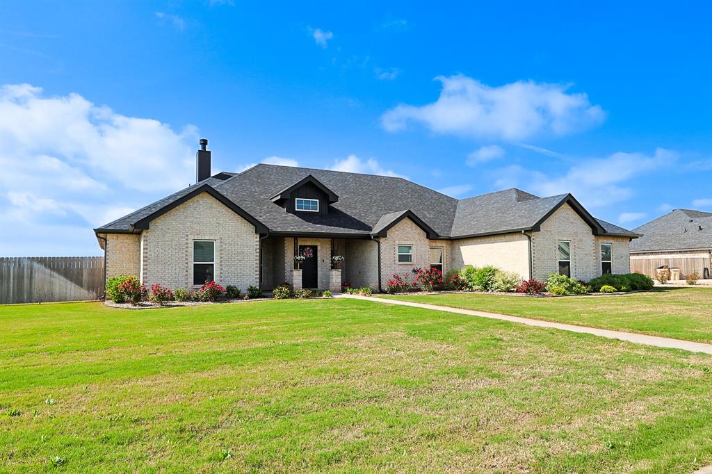 107 Kleingrass Road Abilene, TX 79606 - Photo 4 of 39 a front view of a house with a yard