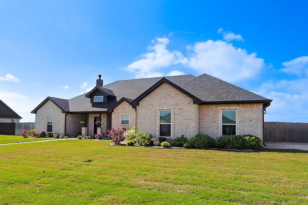 107 Kleingrass Road Abilene, TX 79606 - Photo 5 of 39 a front view of a house with garden