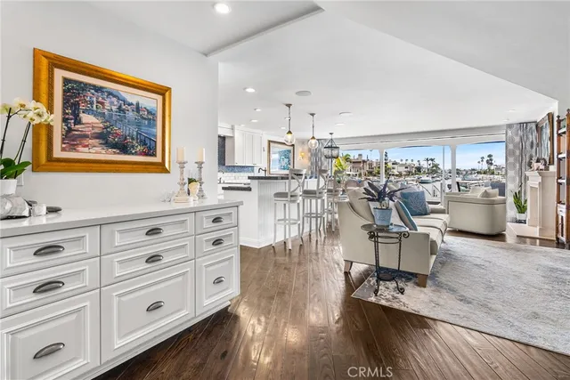 a view of a kitchen with dining table and chairs