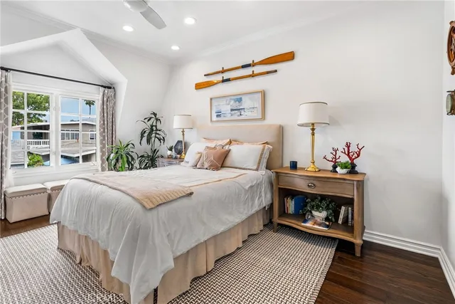 an aerial view of a house with outdoor seating
