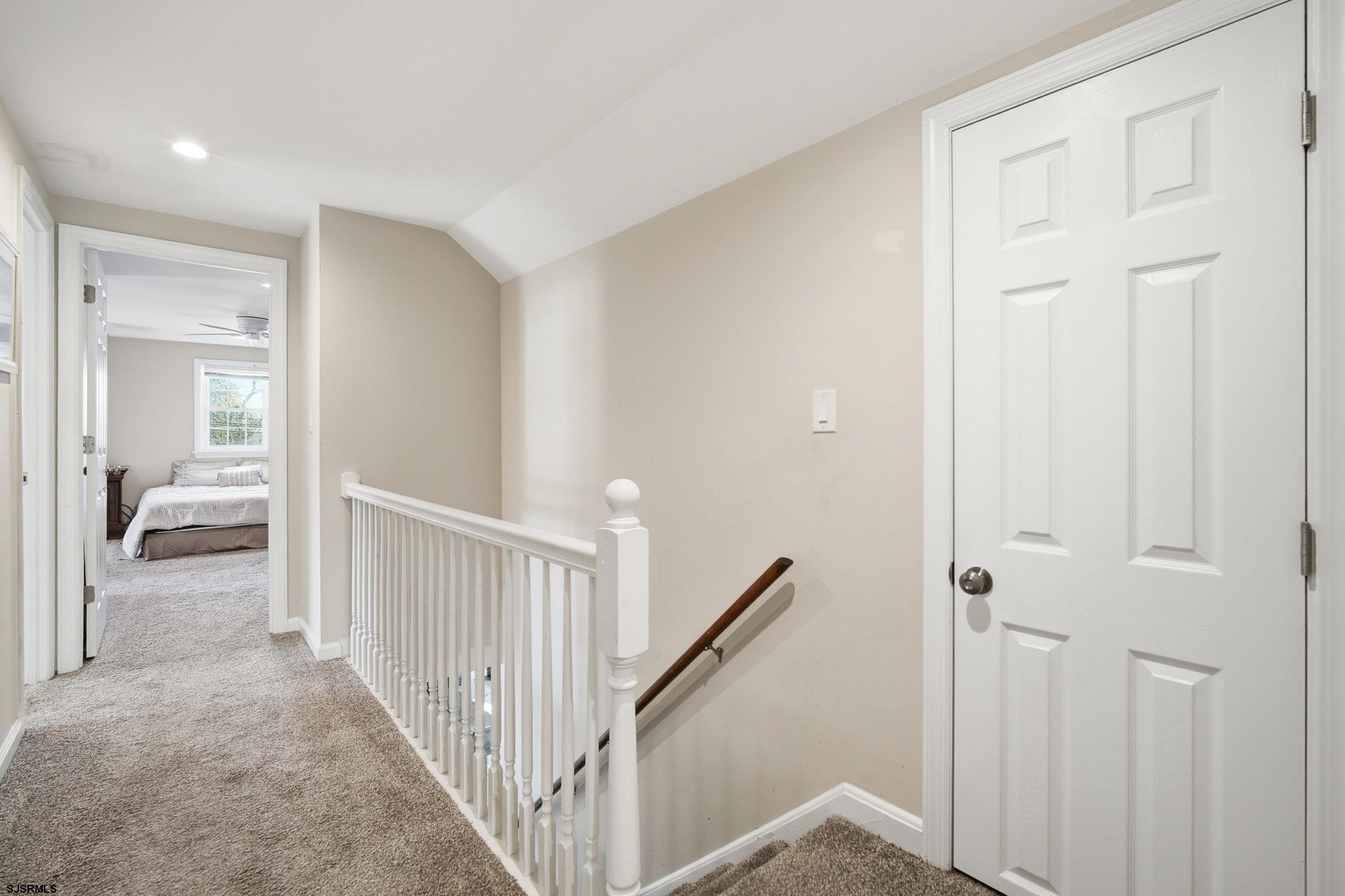 395 1st Street Northfield, NJ 08225 - Photo 22 of 54 a view of a hallway with a livingroom and a bathroom