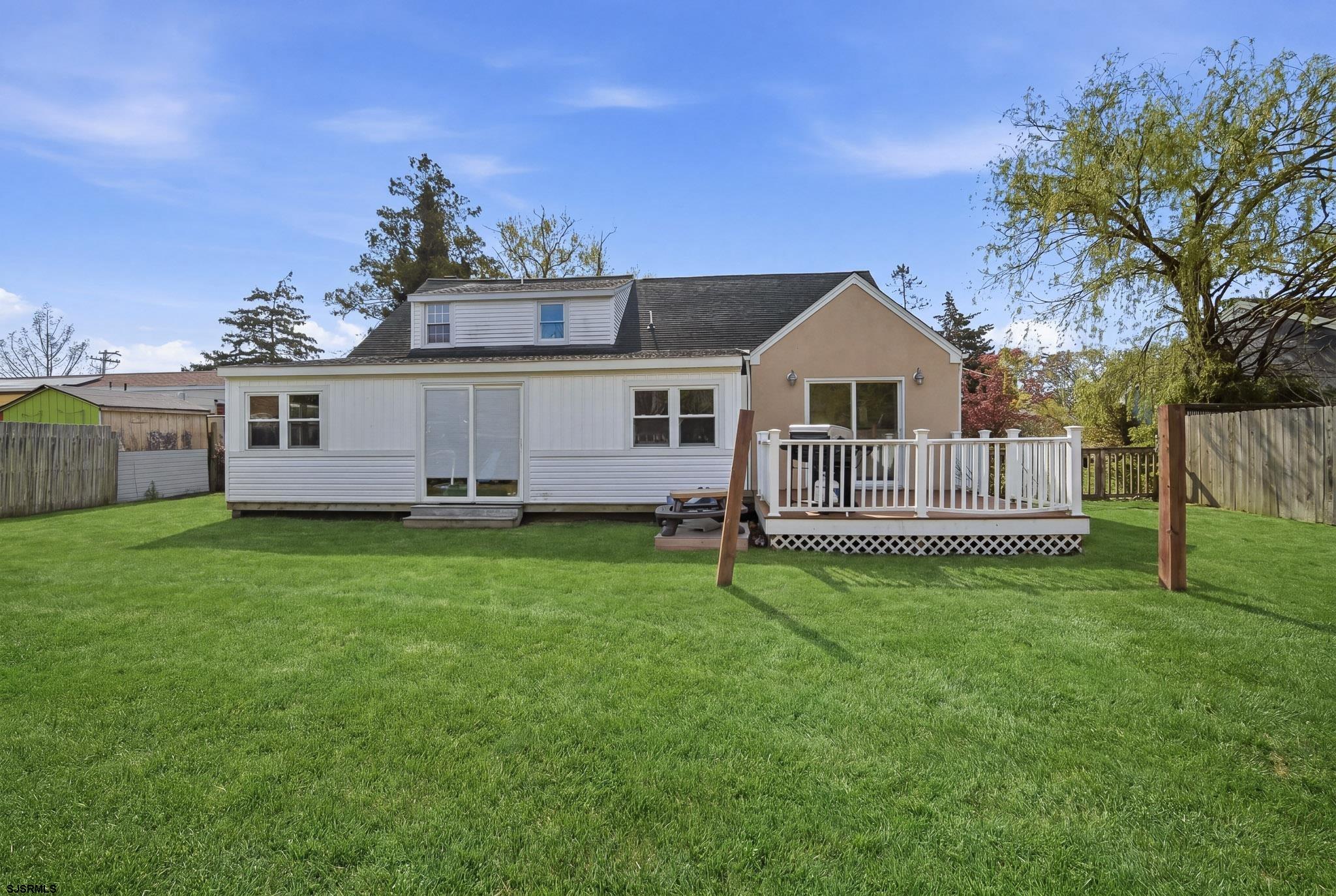 395 1st Street Northfield, NJ 08225 - Photo 30 of 54 a view of a house with a back yard