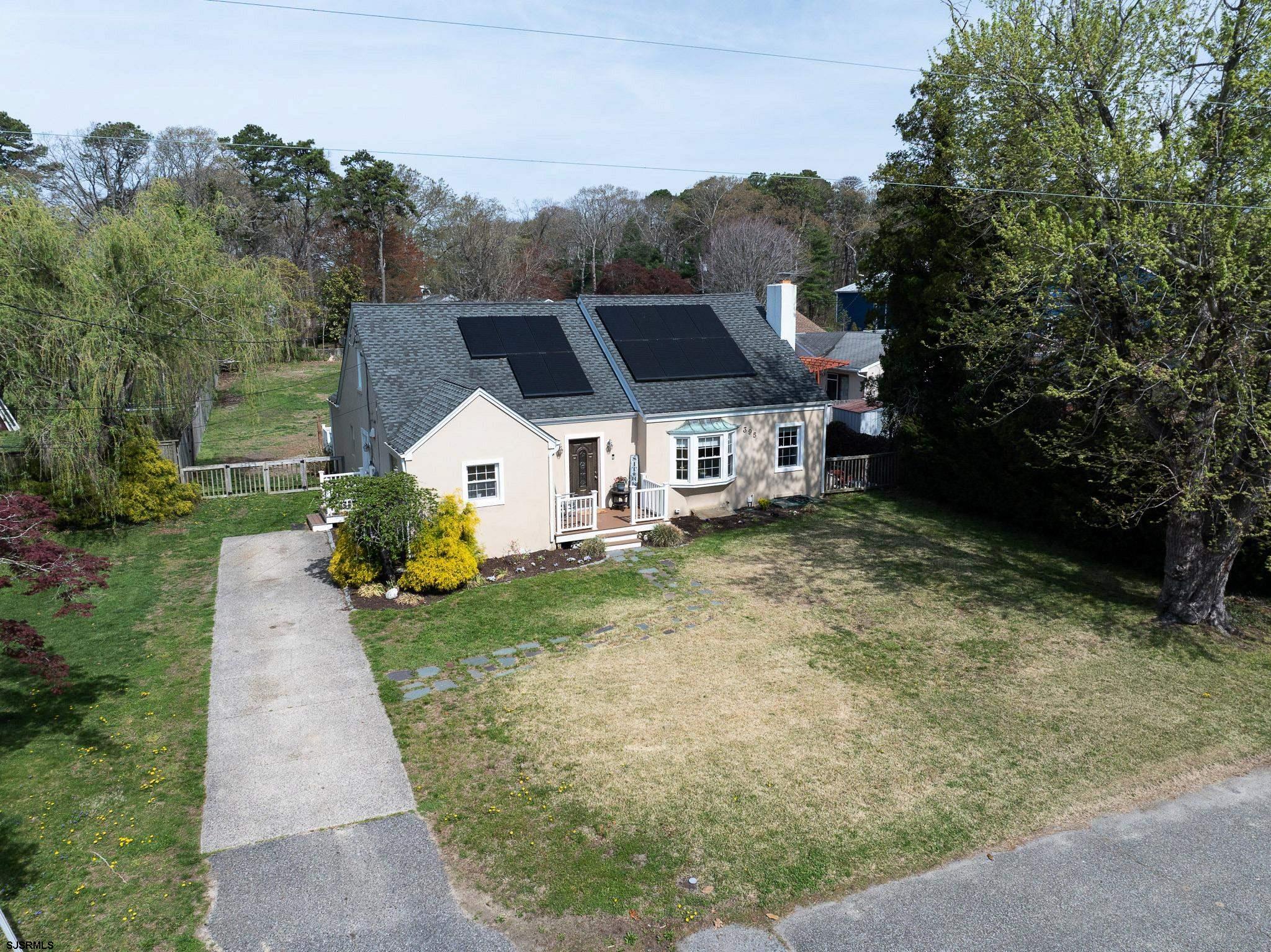 395 1st Street Northfield, NJ 08225 - Photo 32 of 54 a house view with a garden space
