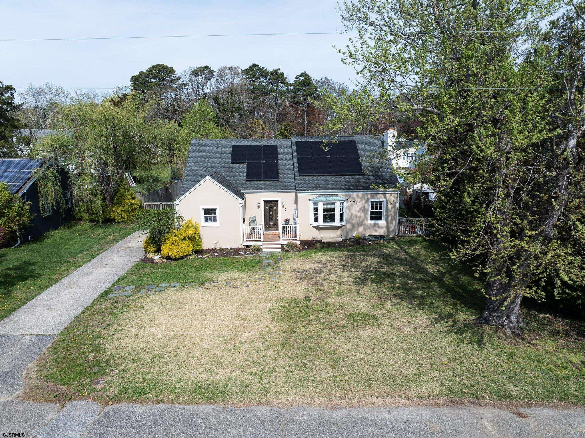 395 1st Street Northfield, NJ 08225 - Photo 33 of 54 a house view with a garden