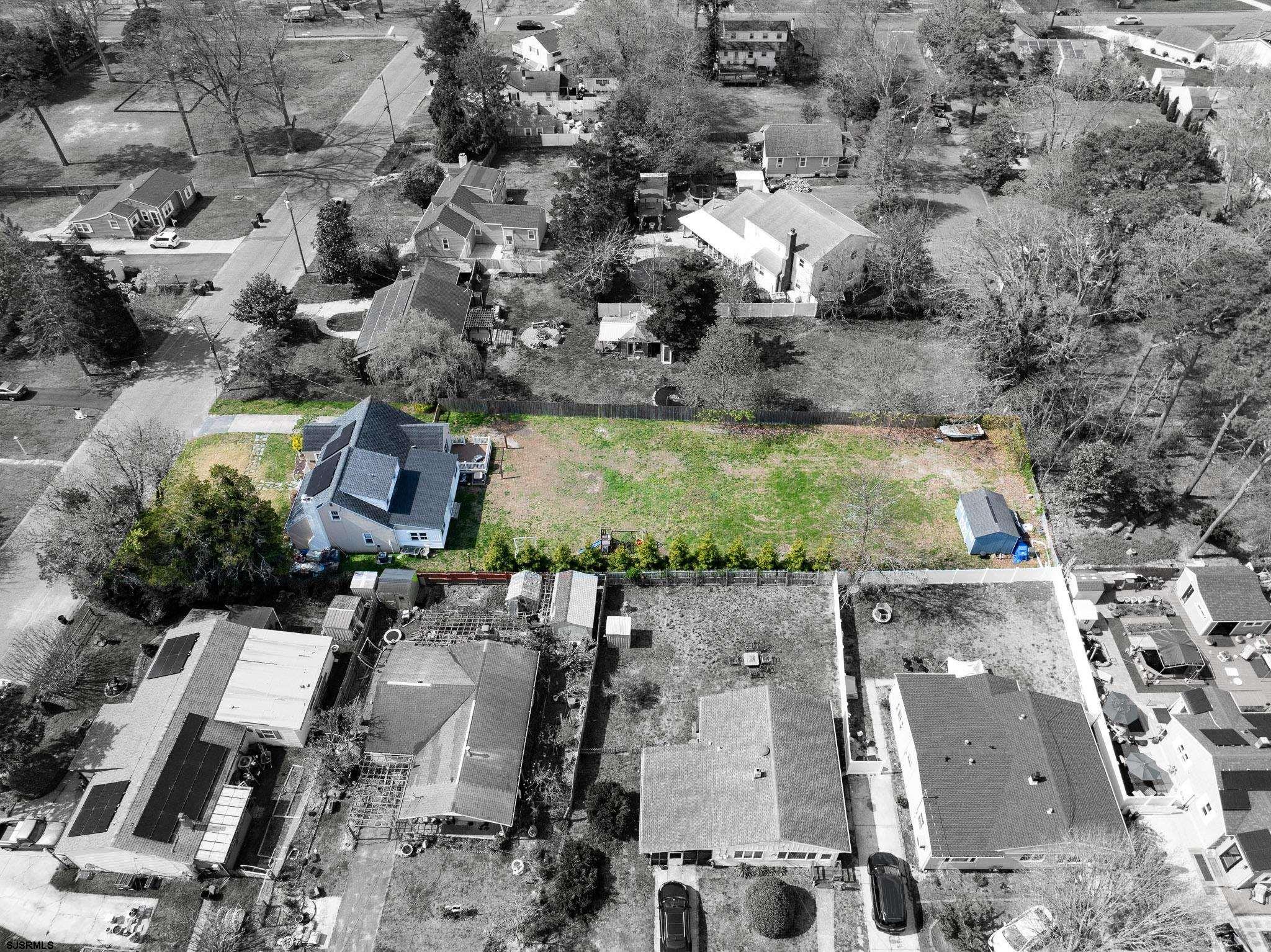 395 1st Street Northfield, NJ 08225 - Photo 41 of 54 an aerial view of residential house with outdoor space
