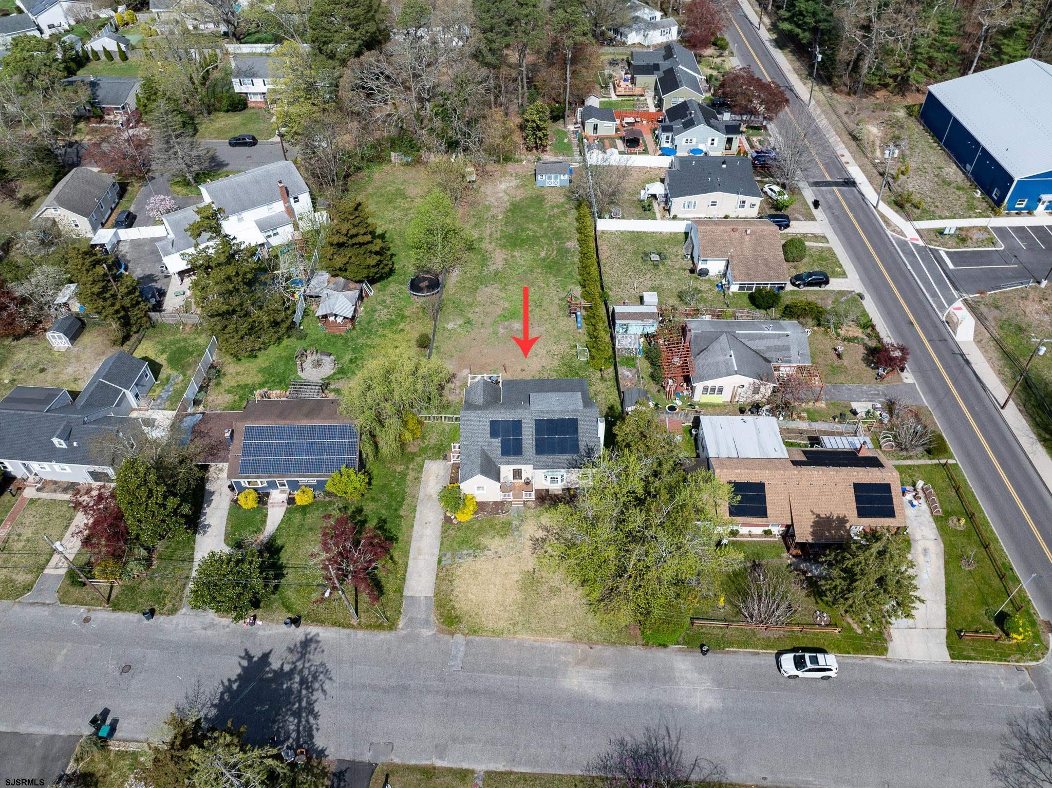 395 1st Street Northfield, NJ 08225 - Photo 43 of 54 an aerial view of multiple houses