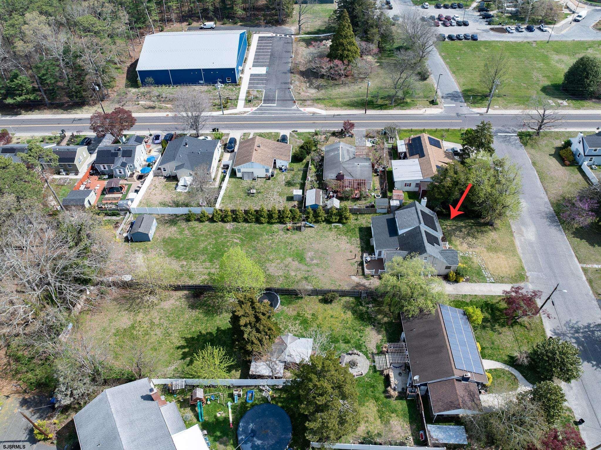 395 1st Street Northfield, NJ 08225 - Photo 45 of 54 an aerial view of houses with outdoor space