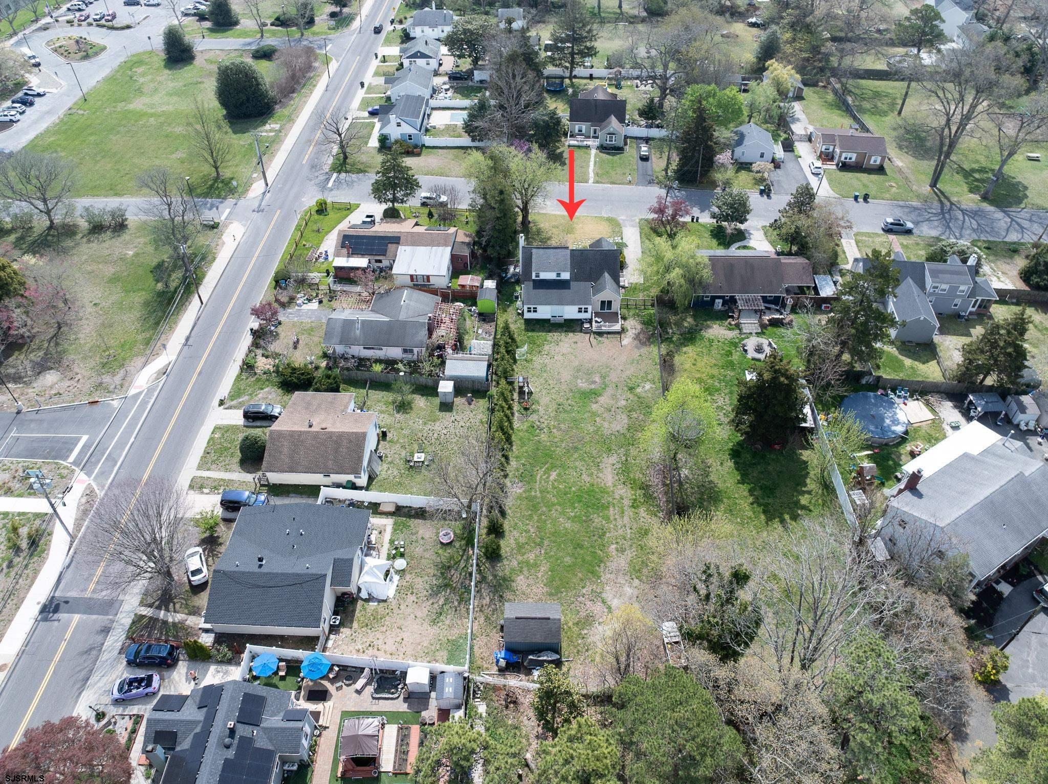 395 1st Street Northfield, NJ 08225 - Photo 47 of 54 an aerial view of residential houses with outdoor space