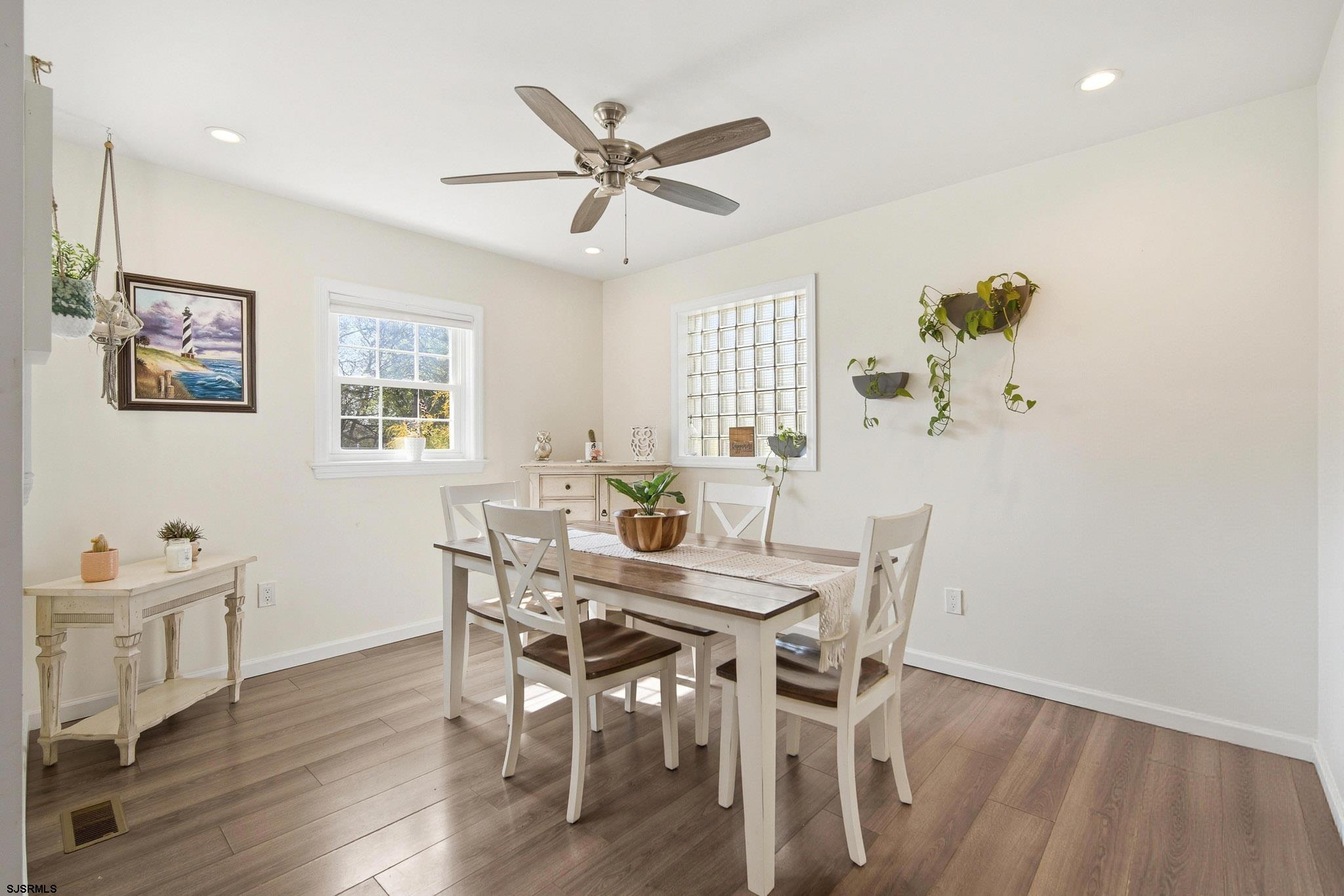 395 1st Street Northfield, NJ 08225 - Photo 10 of 54 a view of a dining room with furniture and a window