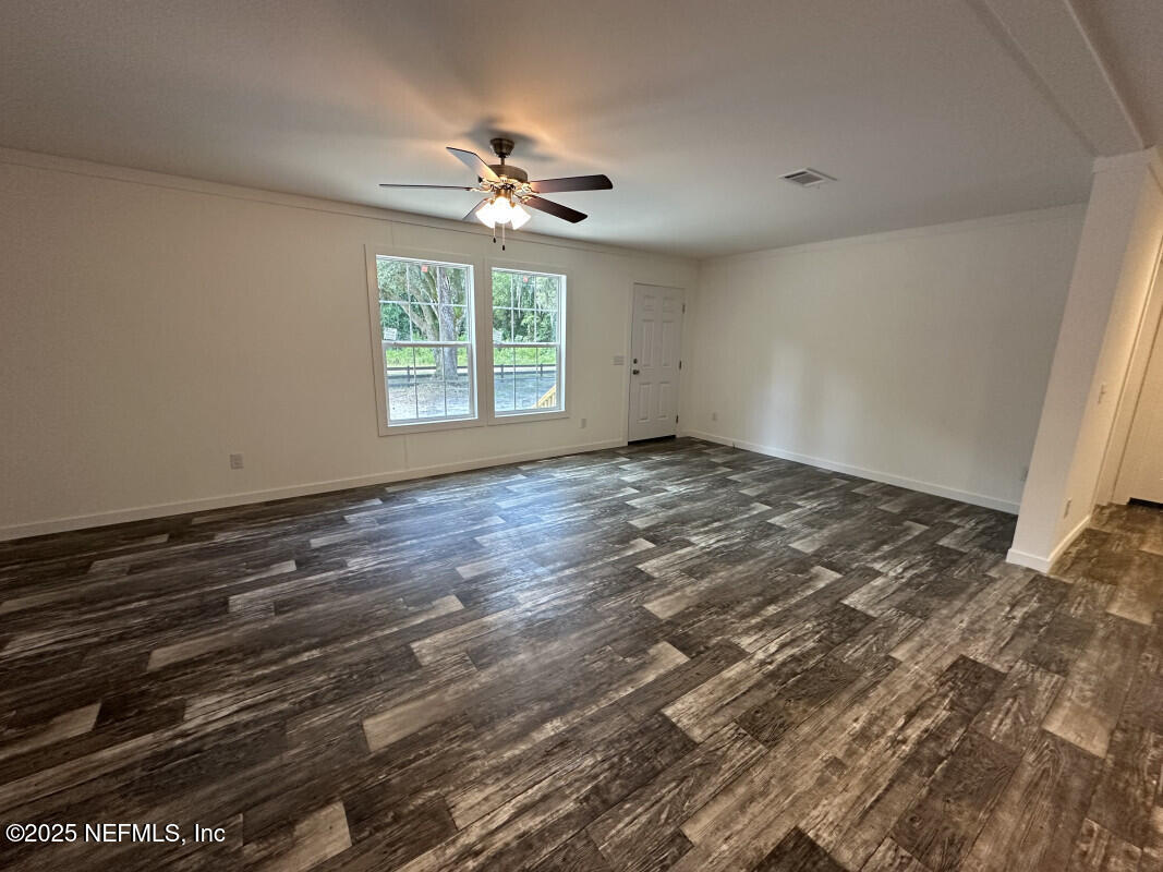 138 Nichols Road Florahome, FL 32140 - Photo 15 of 27 a view of an empty room with a window