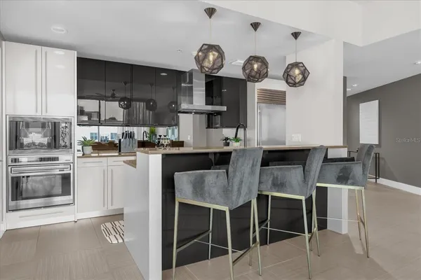a kitchen with a sink cabinets and window