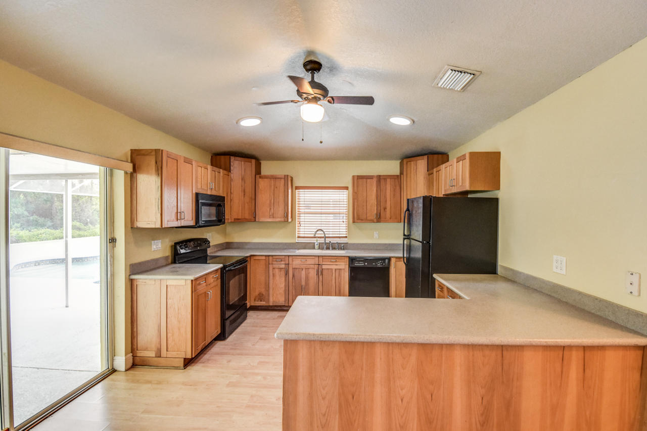 1752 Southwest Del Rio Boulevard Port St. Lucie, FL 34953 - Photo 4 of 22 DSC_7448_49_50_51_52_53_54