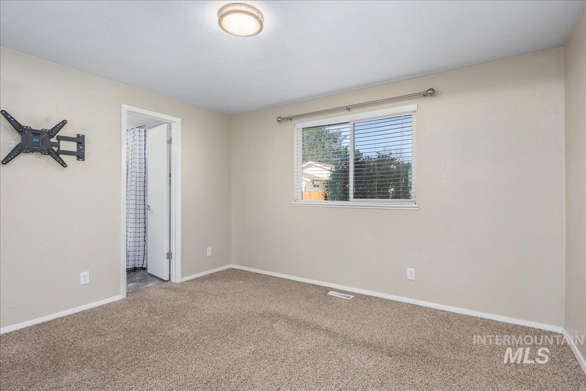 2103 North Hampton Road Boise, ID 83704 - Photo 16 of 40 Unfurnished room with carpet and baseboards