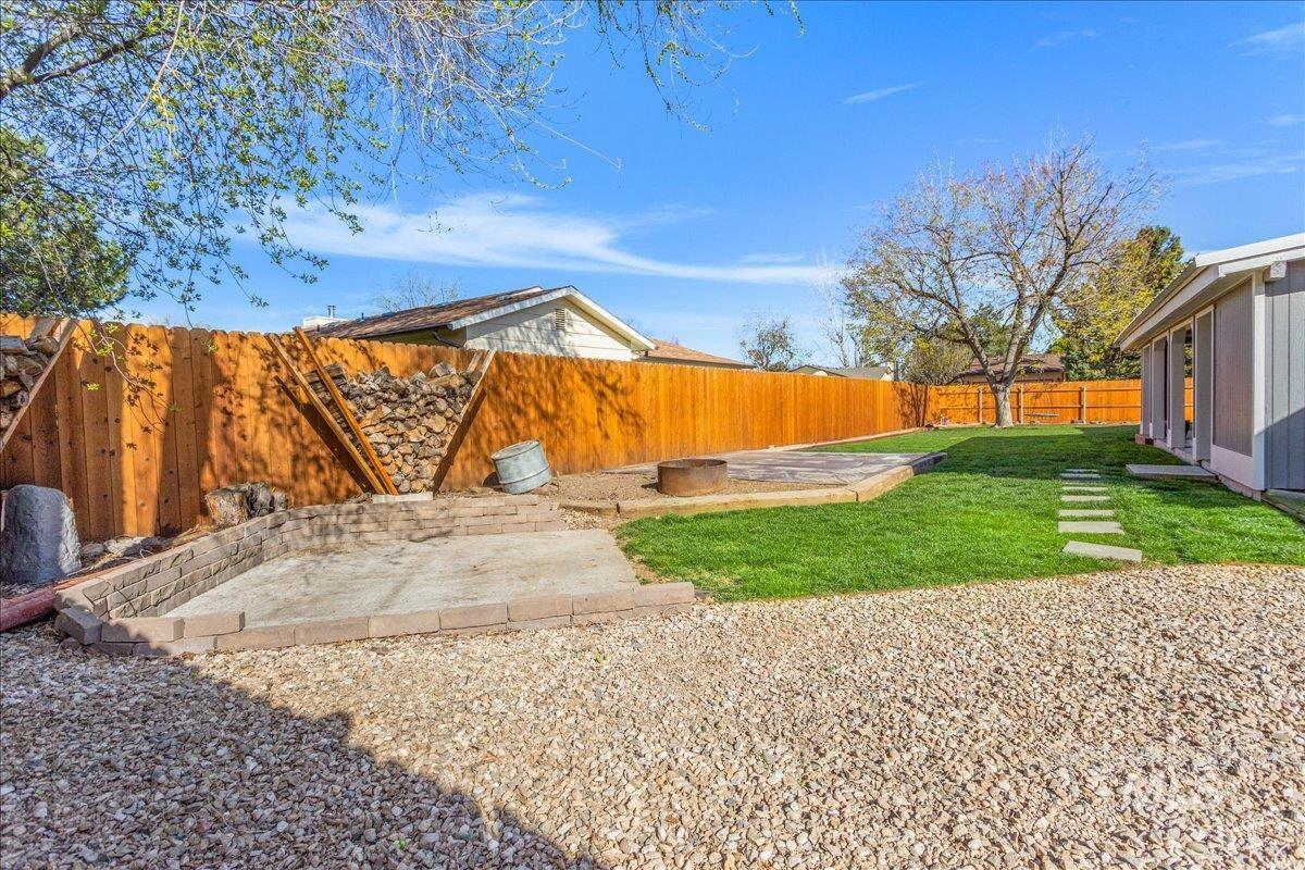 2103 North Hampton Road Boise, ID 83704 - Photo 29 of 40 Fenced backyard featuring a patio area