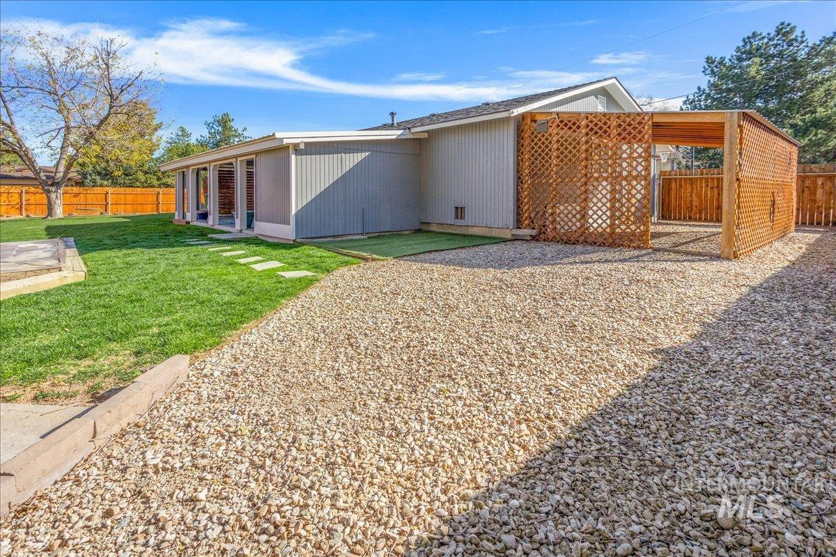 2103 North Hampton Road Boise, ID 83704 - Photo 30 of 40 View of side of property featuring a fenced backyard and a patio