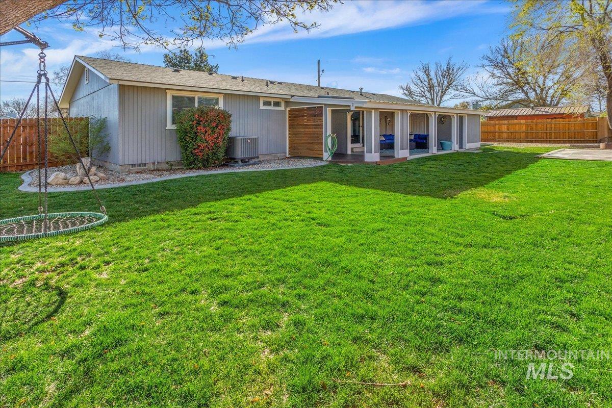 2103 North Hampton Road Boise, ID 83704 - Photo 36 of 40 Back of property featuring a fenced backyard and a patio area