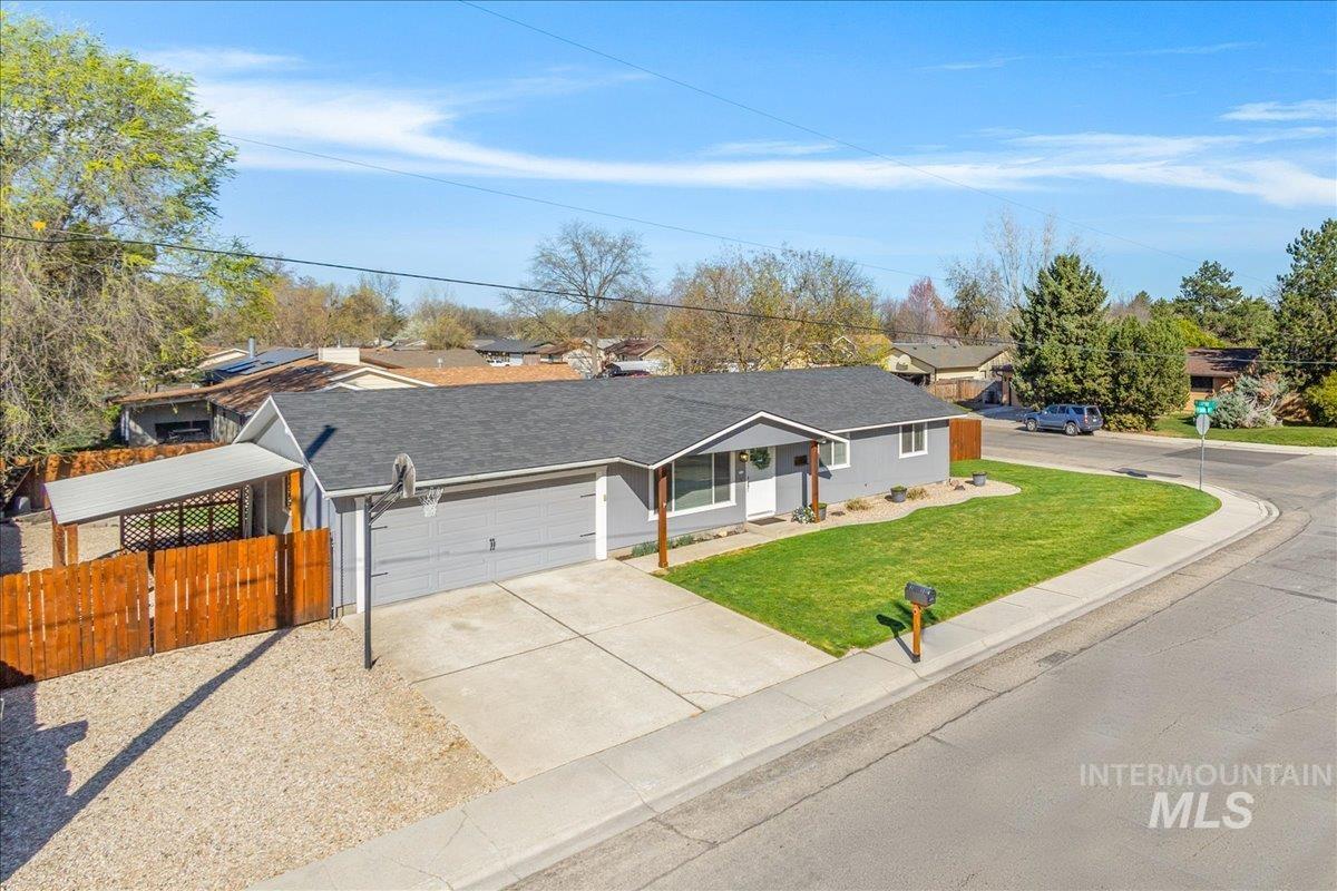 2103 North Hampton Road Boise, ID 83704 - Photo 40 of 40 Single story home featuring driveway, a shingled roof, an attached garage, and a porch