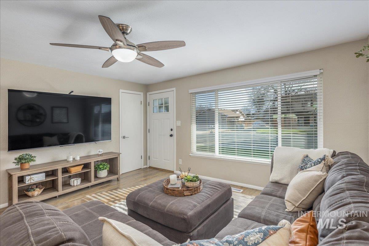 2103 North Hampton Road Boise, ID 83704 - Photo 5 of 40 Living area featuring wood finished floors and ceiling fan