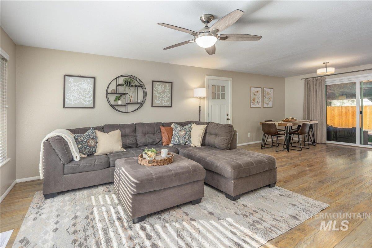 2103 North Hampton Road Boise, ID 83704 - Photo 6 of 40 Living room with ceiling fan and light wood-type flooring