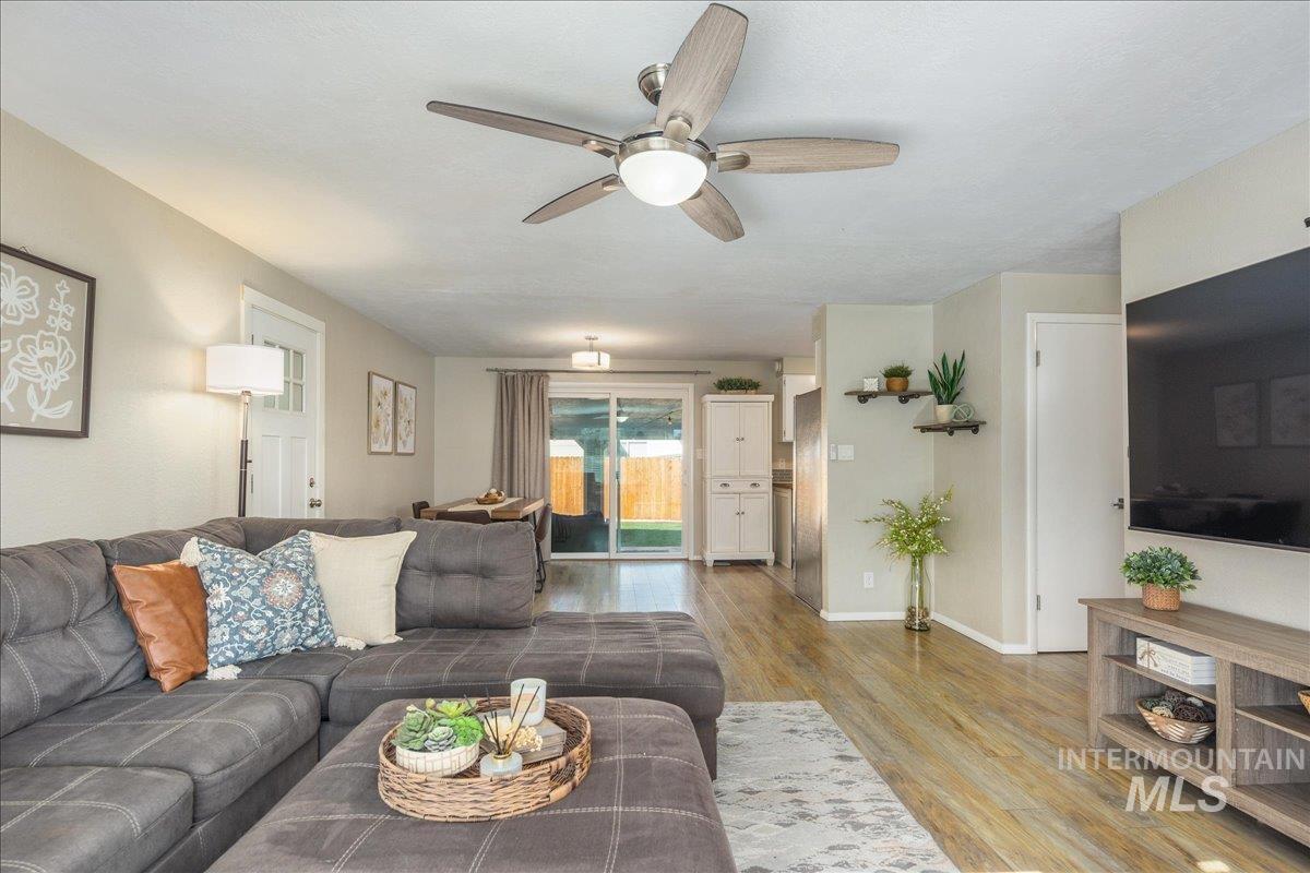 2103 North Hampton Road Boise, ID 83704 - Photo 7 of 40 Living area with a ceiling fan and light wood-style flooring