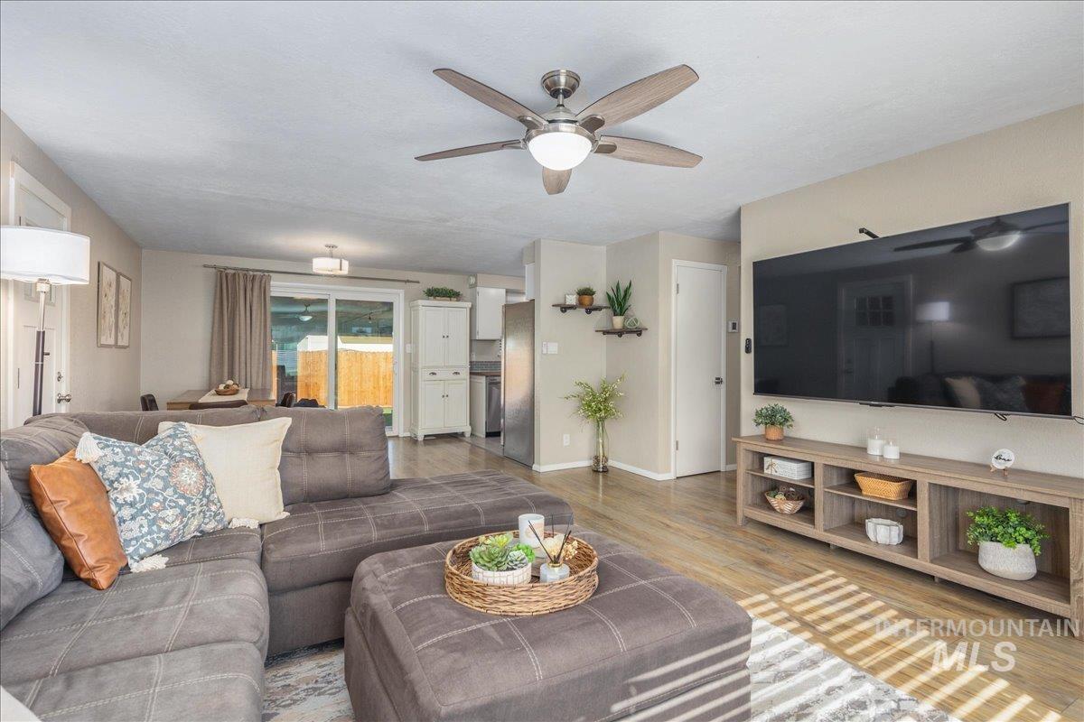 2103 North Hampton Road Boise, ID 83704 - Photo 8 of 40 Living area featuring light wood-style floors and ceiling fan