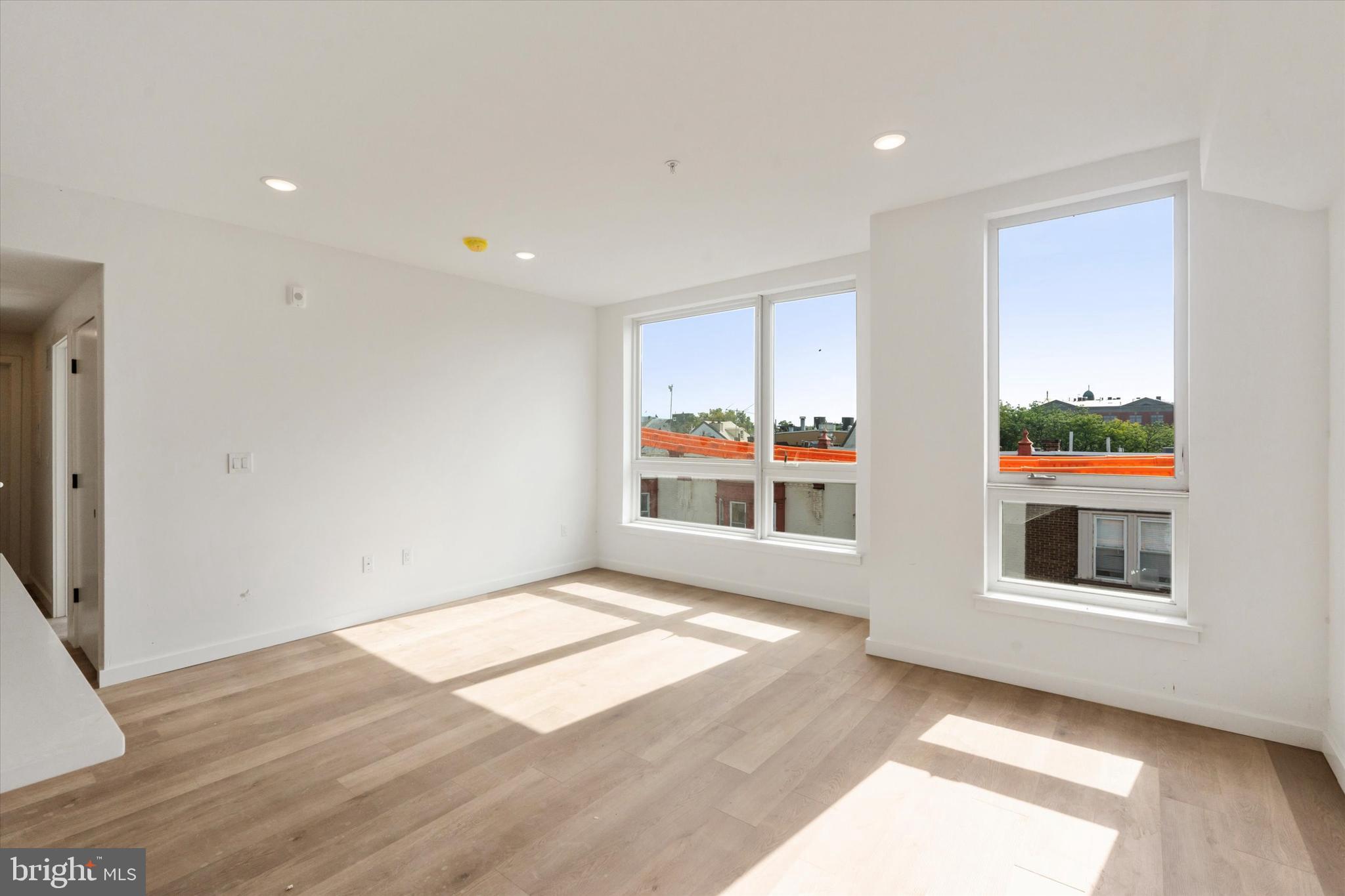 754 South 4th Street, Unit 201 Philadelphia, PA 19147 - Photo 6 of 17 a view of empty room with wooden floor and fan