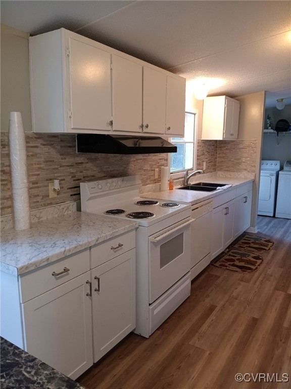 125 Lone Pine Road Crewe, VA 23930 - Photo 15 of 25 Kitchen with white cabinetry, washer and dryer, si