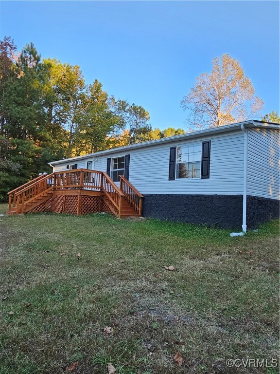125 Lone Pine Road Crewe, VA 23930 - Photo 5 of 25 Rear view of property featuring a wooden deck and