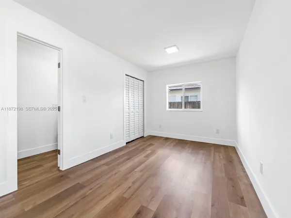 a view of an empty walk in closet