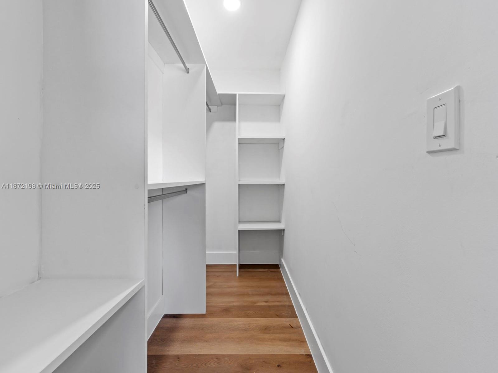 10530 Southwest 146th Street Miami, FL 33176 - Photo 27 of 54 a hallway view with staircase
