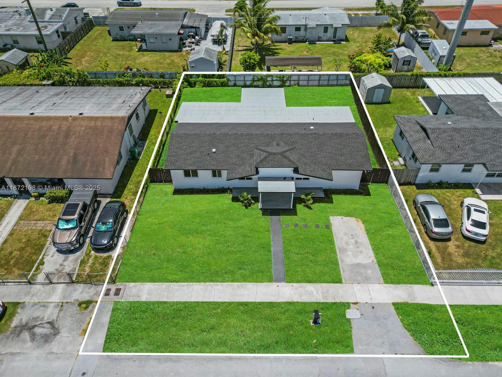 10530 Southwest 146th Street Miami, FL 33176 - Photo 31 of 54 an aerial view of a house with swimming pool