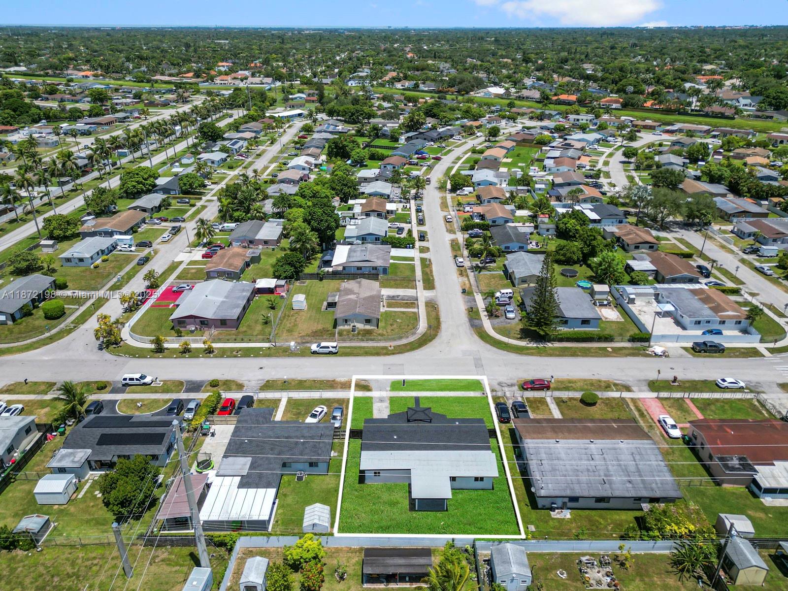 10530 Southwest 146th Street Miami, FL 33176 - Photo 33 of 54 an aerial view of multiple house