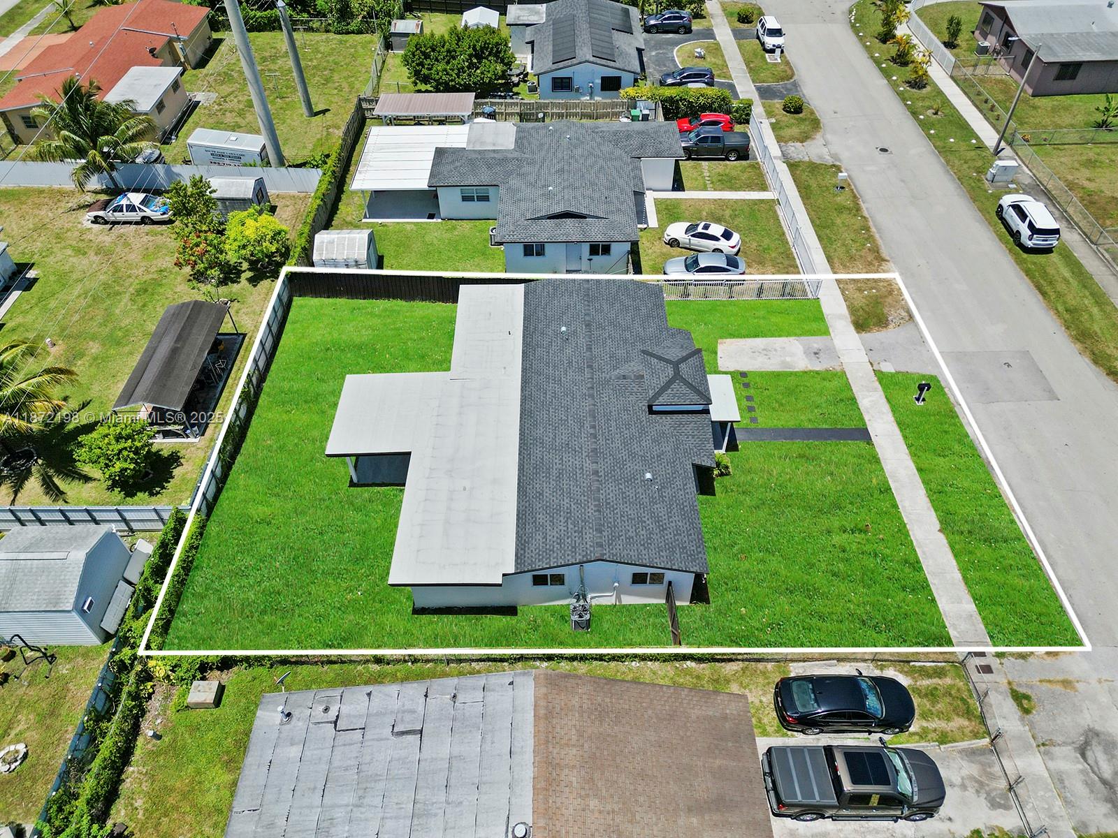 10530 Southwest 146th Street Miami, FL 33176 - Photo 34 of 54 an aerial view of house with a garden