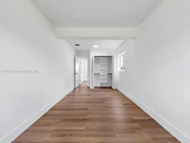 a view of a backyard with a garden