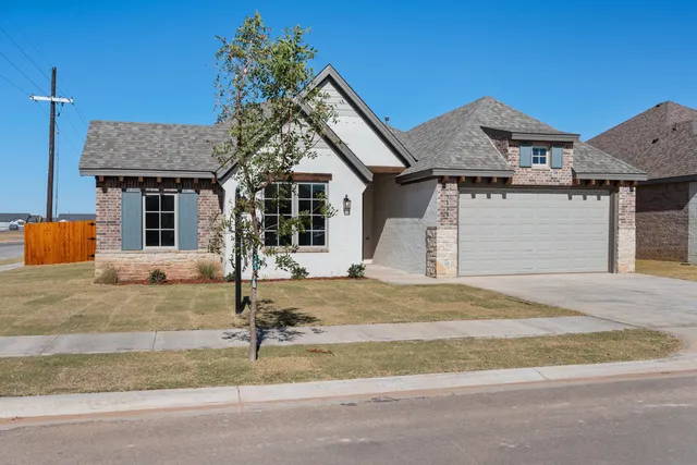 front view of a house with a street
