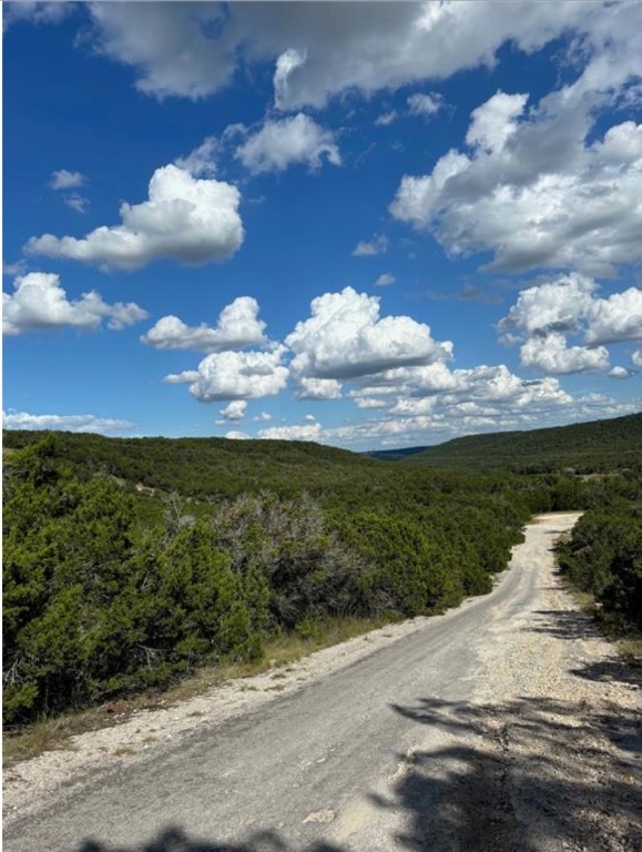 a view of a lake with a big yard
