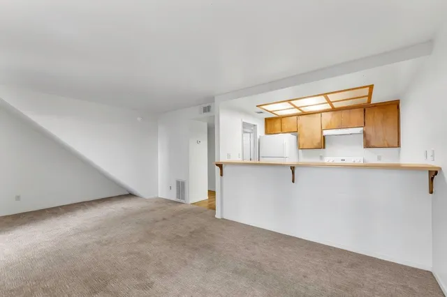 a view of a room with a window