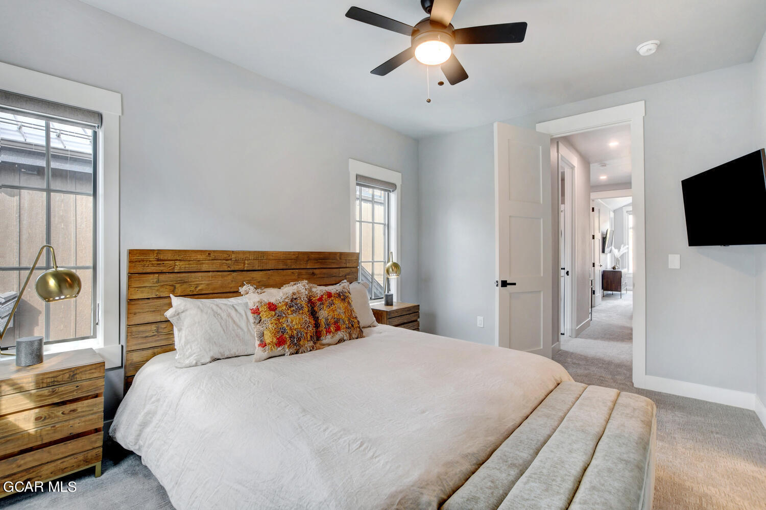 Undisclosed Address Winter Park, CO 80482 - Photo 20 of 52 a bedroom with a bed and a flat screen tv