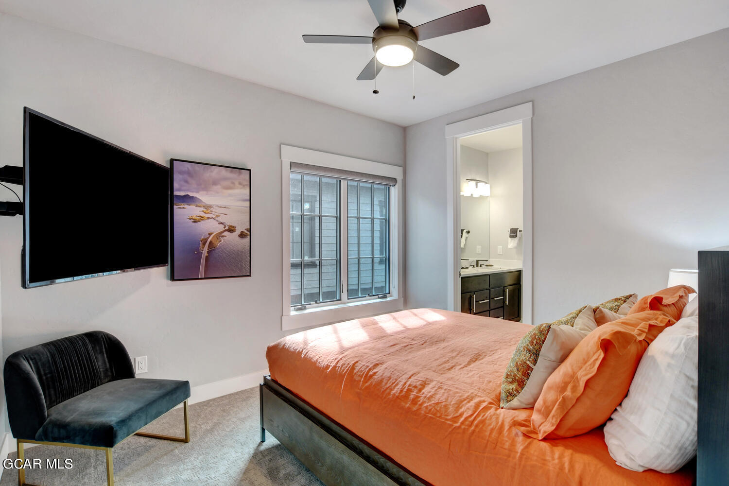 Undisclosed Address Winter Park, CO 80482 - Photo 23 of 52 a bedroom with a bed and flat screen tv