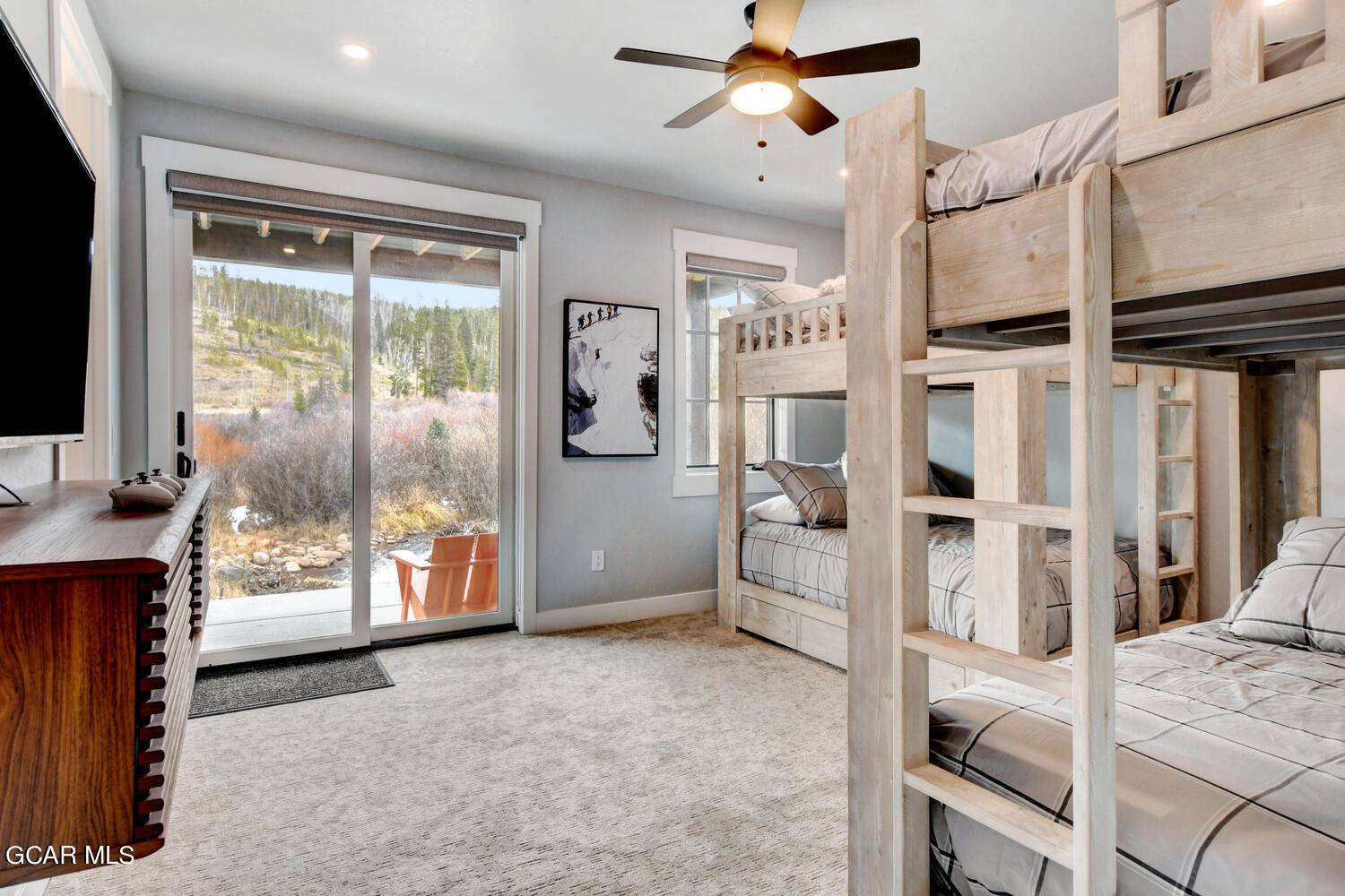 Undisclosed Address Winter Park, CO 80482 - Photo 26 of 52 a view of a livingroom with furniture and a flat screen tv