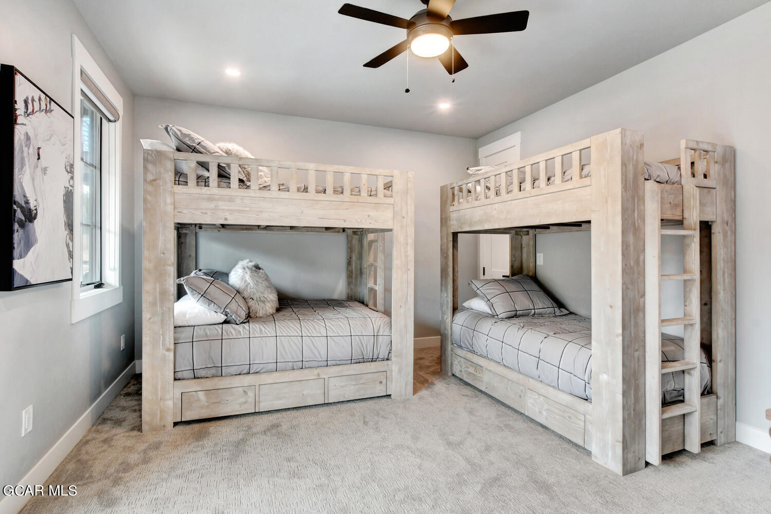 Undisclosed Address Winter Park, CO 80482 - Photo 27 of 52 a bedroom with a bed and a large mirror