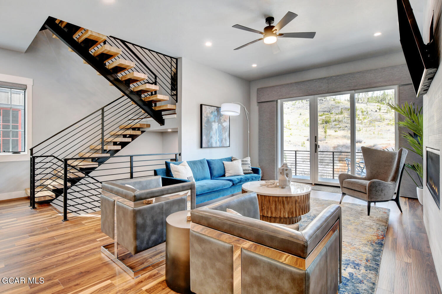Undisclosed Address Winter Park, CO 80482 - Photo 4 of 52 a living room with furniture and wooden floor