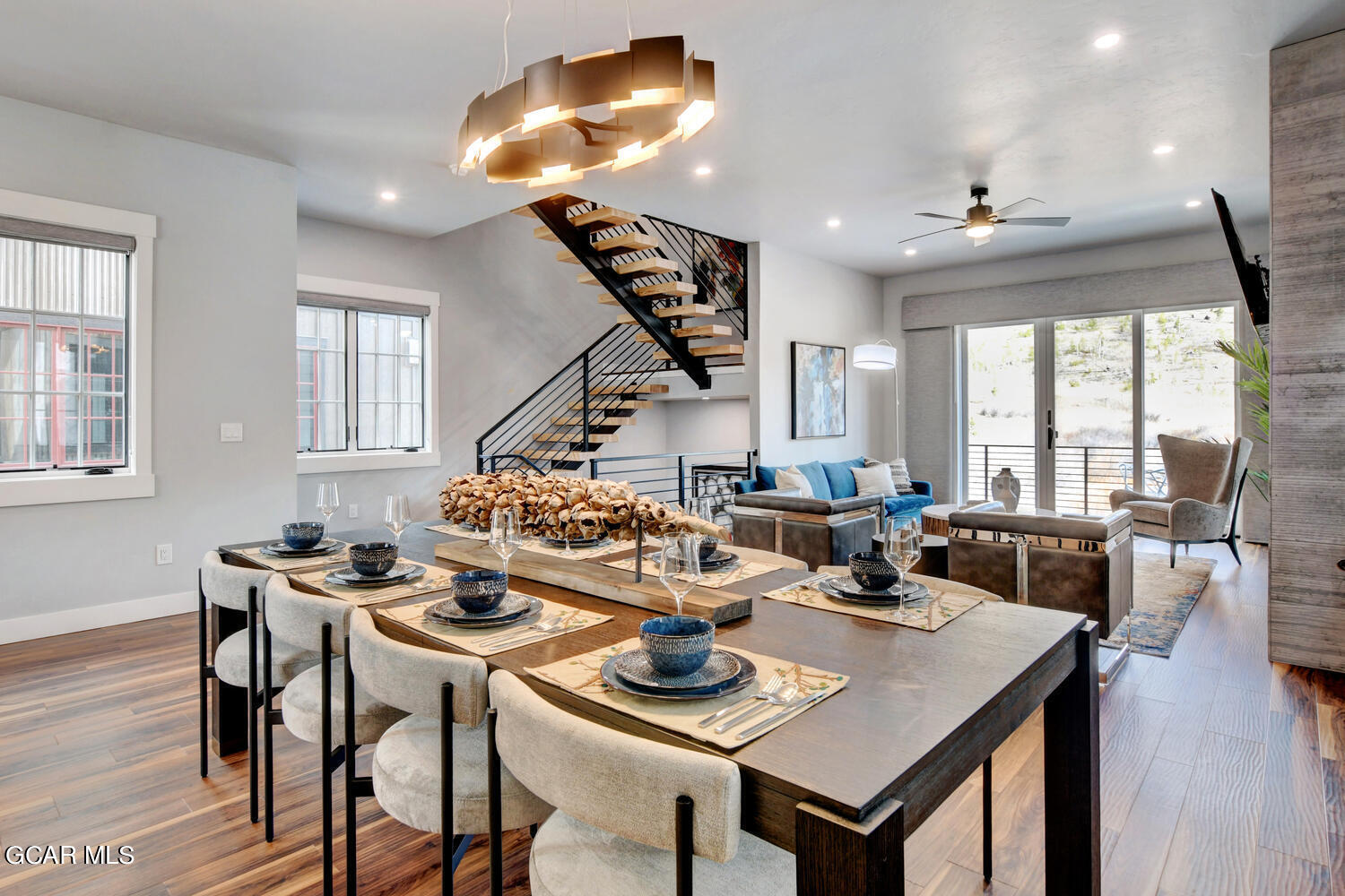 Undisclosed Address Winter Park, CO 80482 - Photo 7 of 52 a view of a dining room with furniture window and wooden floor