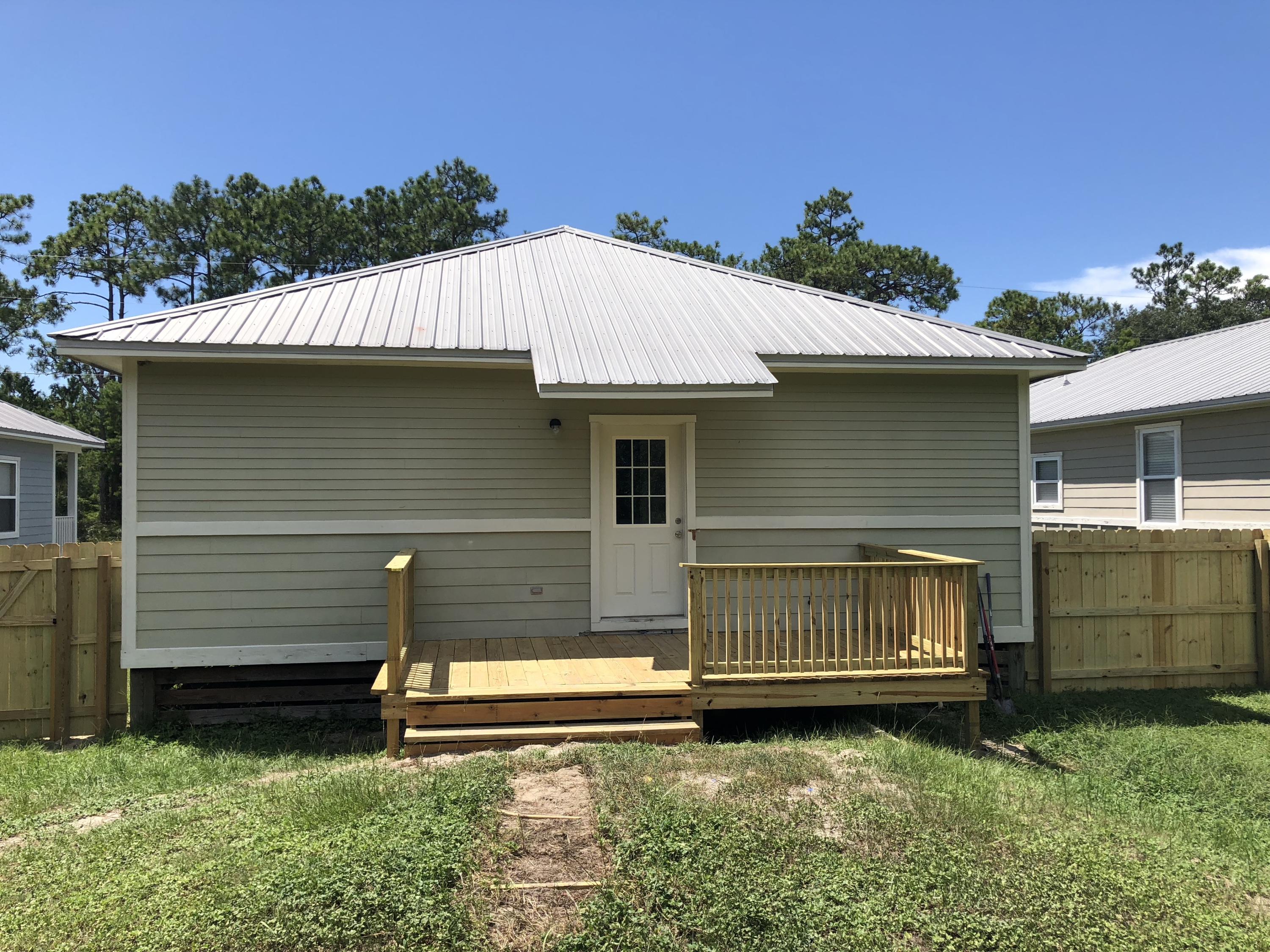 249 County Line Road Niceville, FL 32578 - Photo 5 of 17 a view of back yard of the house