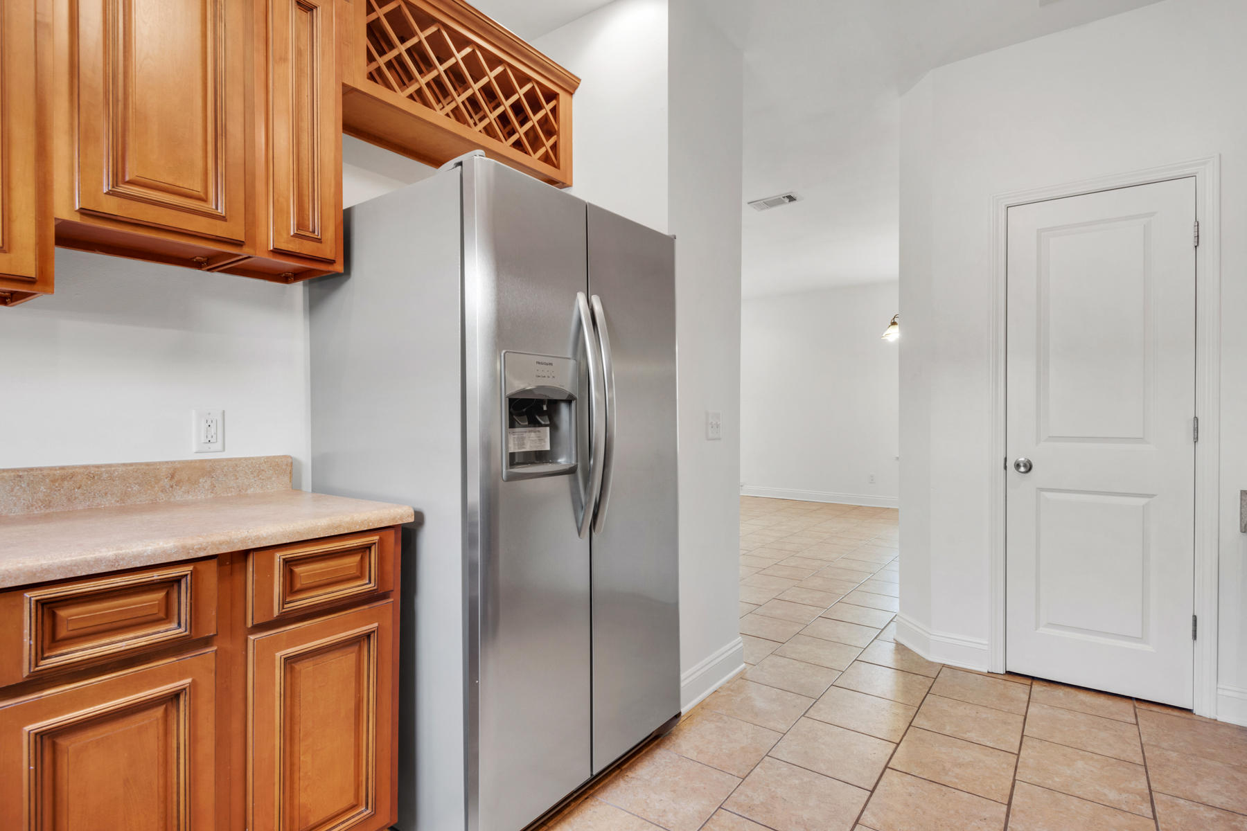 249 County Line Road Niceville, FL 32578 - Photo 6 of 17 a kitchen with stainless steel appliances granite countertop a refrigerator and a sink