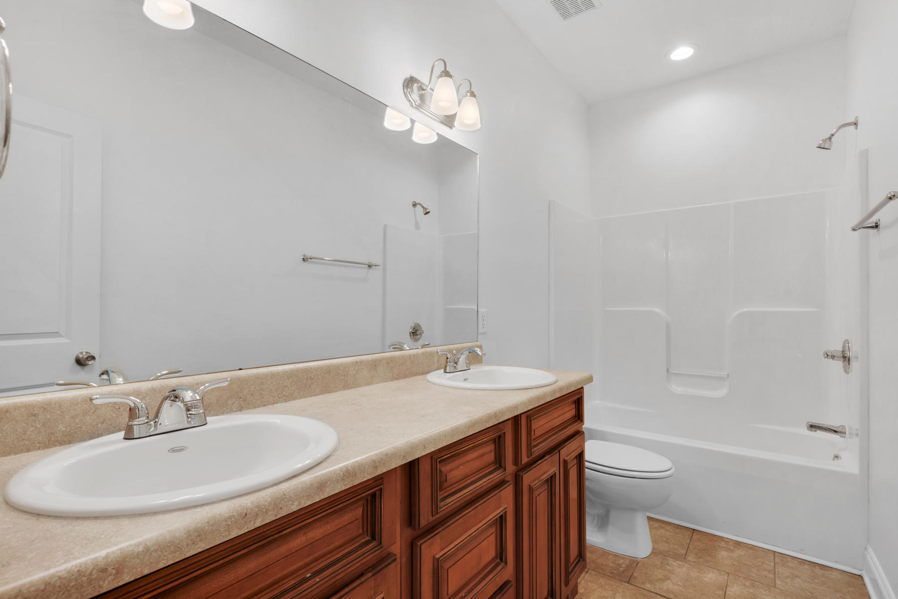 249 County Line Road Niceville, FL 32578 - Photo 9 of 17 a bathroom with a sink a toilet a shower and a mirror