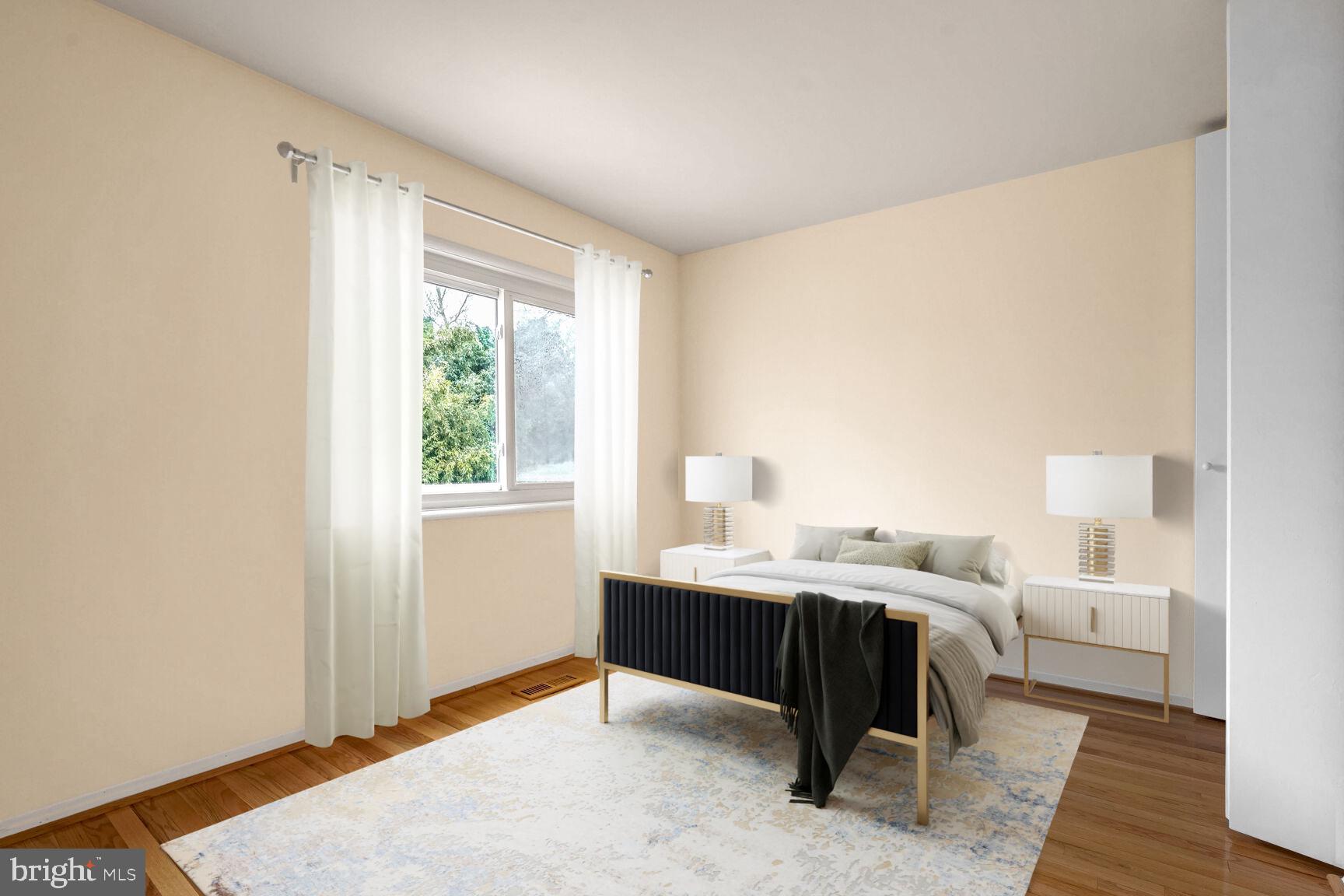 11350 Links Drive Reston, VA 20190 - Photo 11 of 22 a bedroom with a bed and a large window