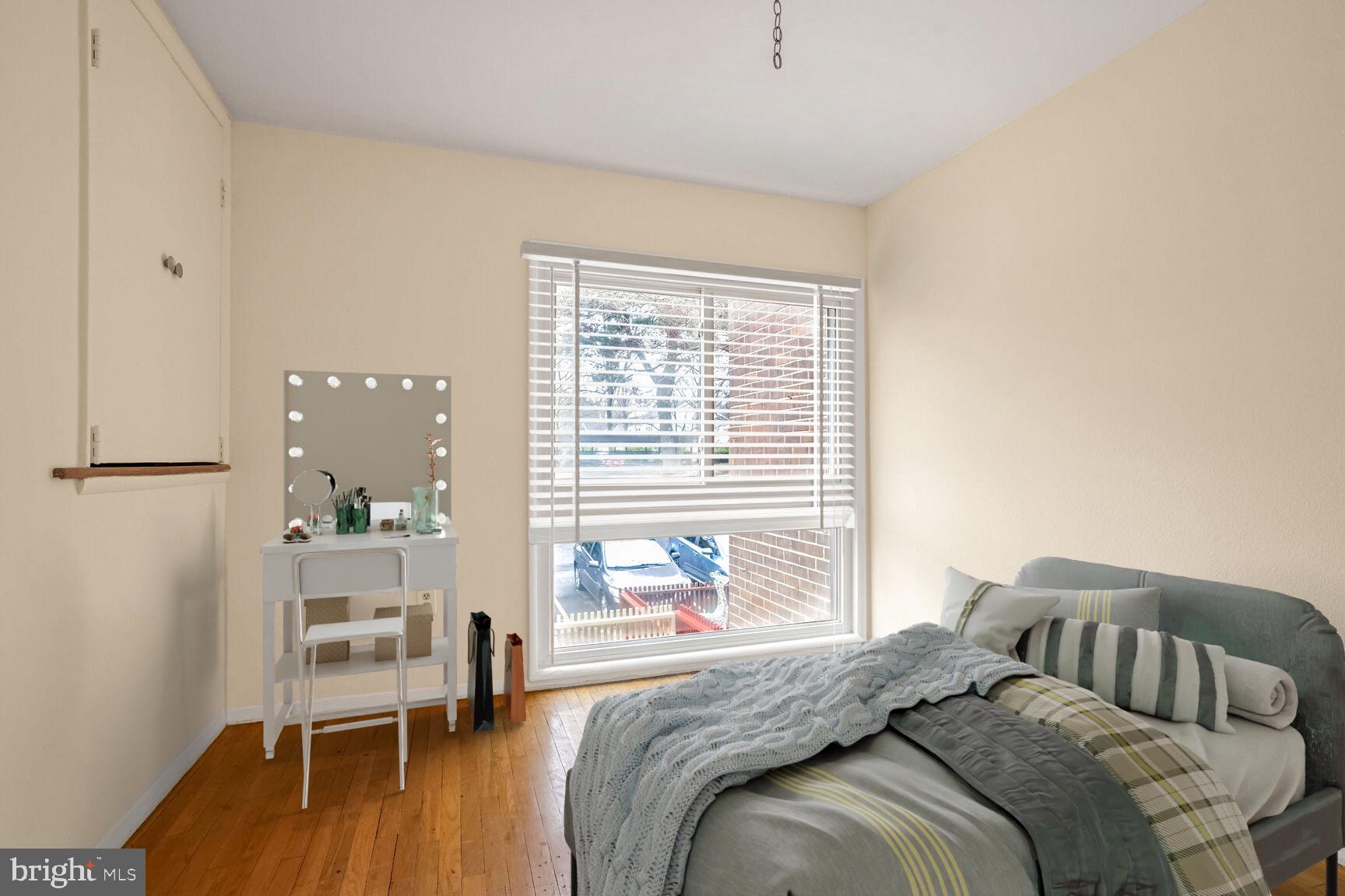 11350 Links Drive Reston, VA 20190 - Photo 14 of 22 a bedroom with a bed and a large window