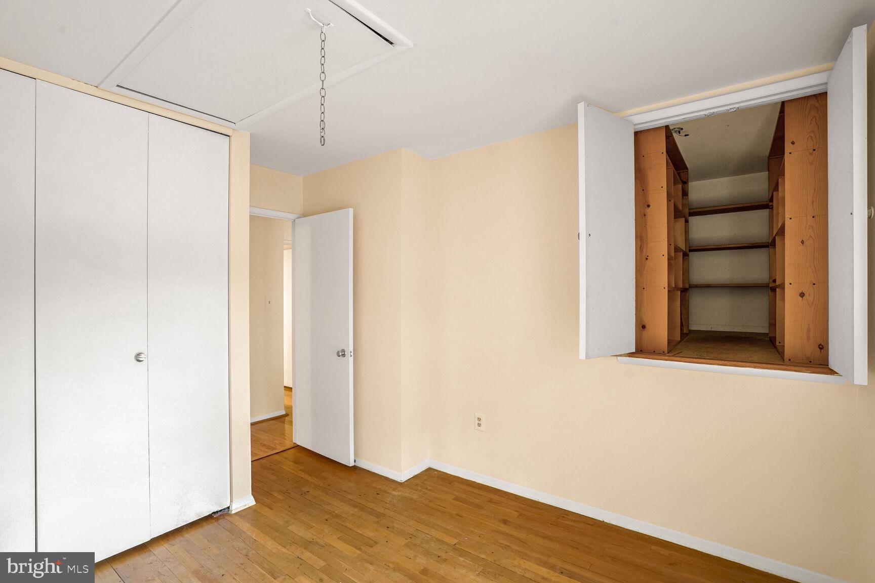 11350 Links Drive Reston, VA 20190 - Photo 15 of 22 a view of a room with wooden floor and brick walls