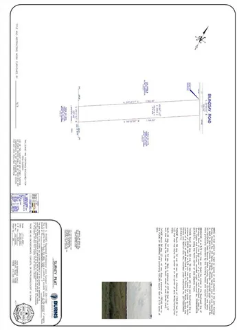 a picture of a bathroom with a shower